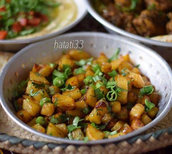 طريقة عمل بطاطس حامضة بالليمون والكزبرة