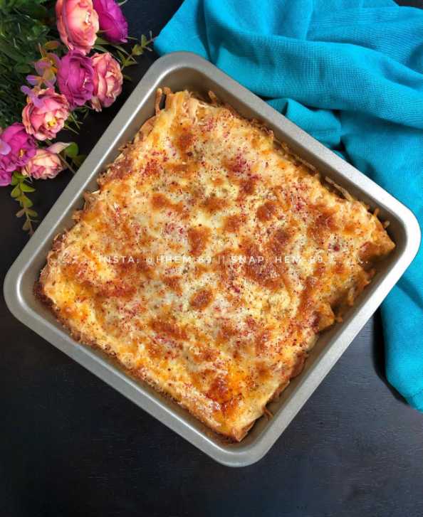 طريقة عمل انشيلادا الدجاج والجبن طريقة عمل انشيلادا الدجاج والجبن